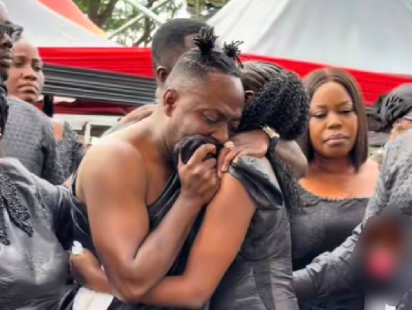 Choirmaster broke down in tears as he and his two daughters paid their final respects to late actress Beverly Afaglo in Accra.